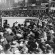 A crowd gathers around a Red Cross ambulance during the women’s suffrage procession in Washington, 1913. Library of Congress via AP Images.